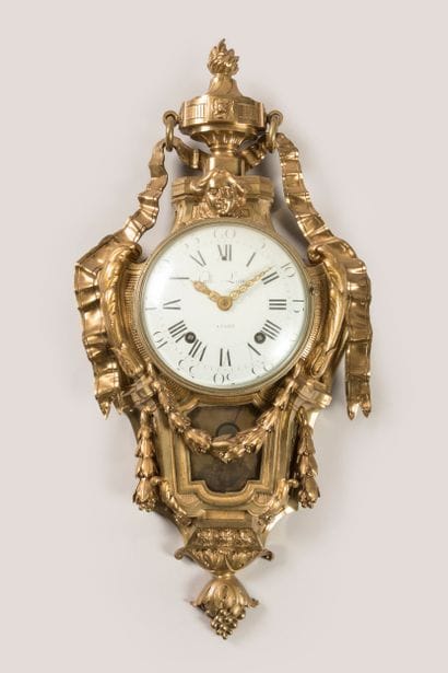 An ormolu sconce known as a cartel au ruban,...