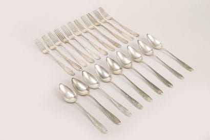 Neuf cuillères et onze fourchettes en argent,...