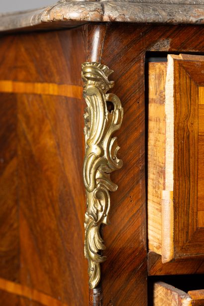 Rosewood and violetwood veneered chest of...