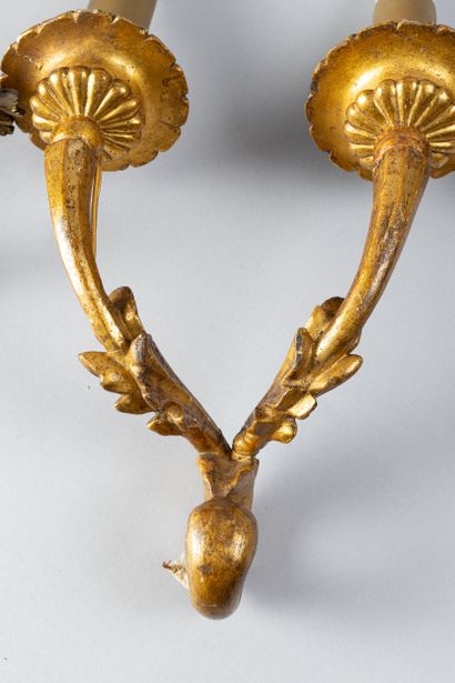 Pair of two-light arms in carved wood, formerly...
