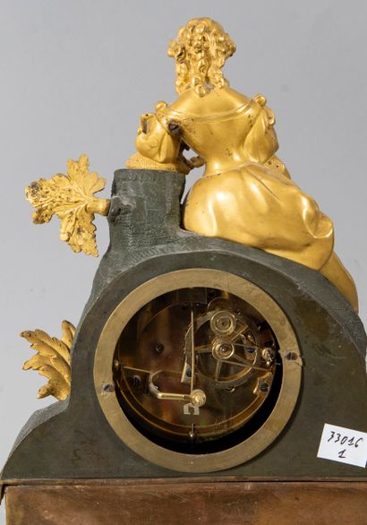 Bronze clock with two patinas depicting a...