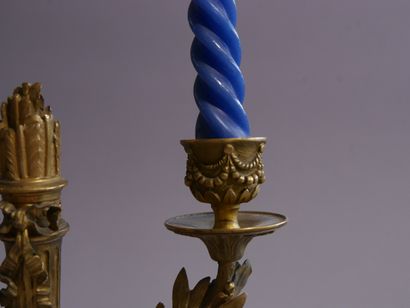 Pair of chased and gilded bronze torches,...