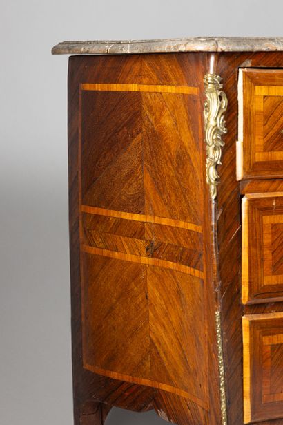 Rosewood and violetwood veneered chest of...