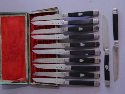 12 knives, silver blade, blackened wooden...