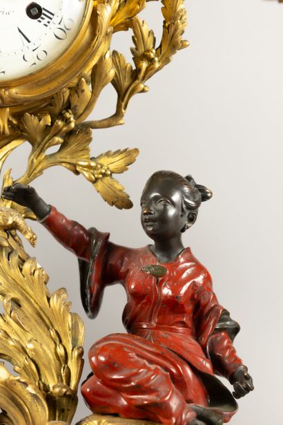 Chased bronze, gilded, patinated and red...