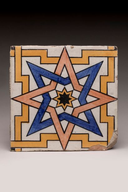 Earthenware tile with polychrome decoration...