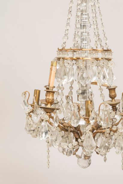 Eight-arm gilt bronze chandelier with tassels...