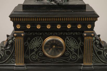 Patinated, gilded and engraved bronze clock...