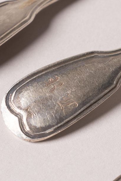Silver set including : 
13 teaspoons 
1 table...