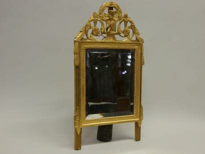 Louis XVI style pediment mirror

In molded,...