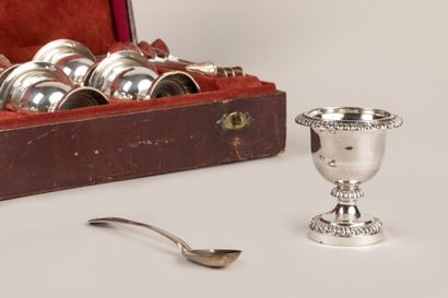 Eight egg cups and their spoons in 950°/°°...