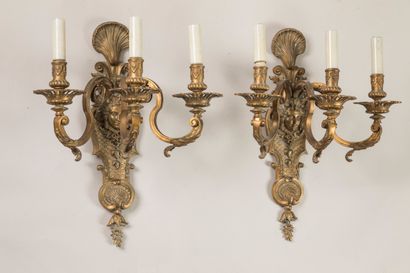 Pair of ormolu three-light sconces, the base...