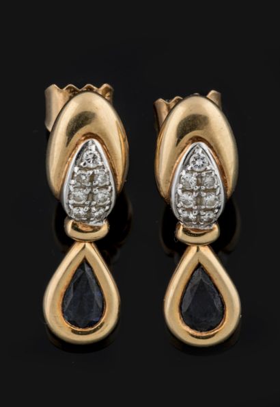 Pair of sapphire and diamond-paved earrings...