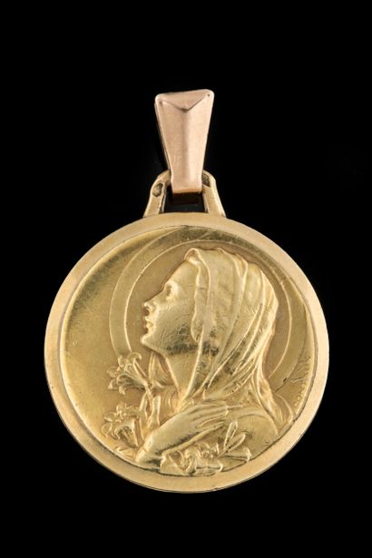 Profile medal of a virgin with veil and lily...