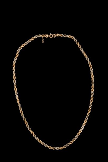 Twisted necklace adorned with a yellow and...