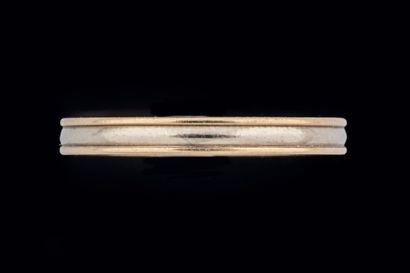 Two-groove wedding band in white and yellow...