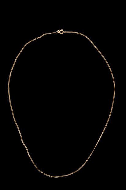 Yellow gold gourmette chain with heavy wear
(750...