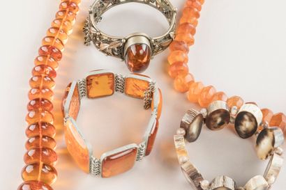 2 amber necklaces, 2 bracelets and 1 third...