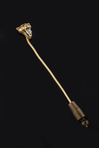 Tie pin with gargoyle or tiger head holding...