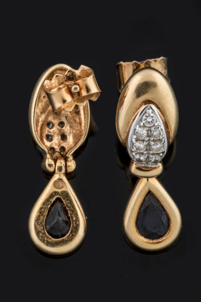 Pair of sapphire and diamond-paved earrings...