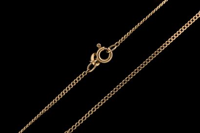 Yellow gold gourmette chain with heavy wear
(750...