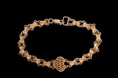 Bracelet centré d’un cœur dessus en cage...