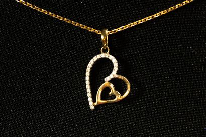 Chaîne forçat et son pendentif double cœur...