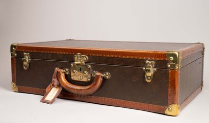 LOUIS VUITTON 
Valise de voyage rigide en...