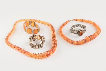 2 amber necklaces, 2 bracelets and 1 third...