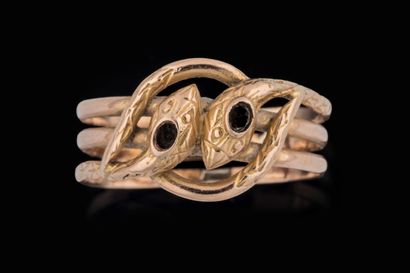Bague à deux têtes de serpent en or jaune...