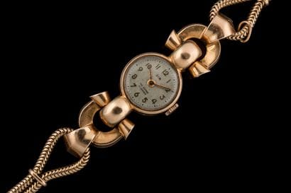 GIR. Montre bracelet de dame en or jaune...