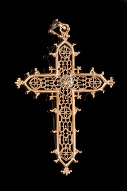 Worked cross centered with a white cultured...