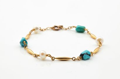 Bracelet souple à maillons ogives en or jaune...