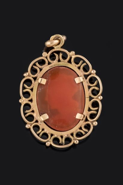 Pendant featuring a cameo with a woman's...