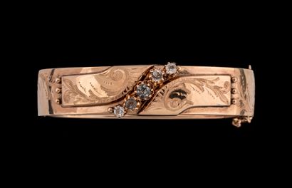 Opening bangle bracelet centered with colorless...