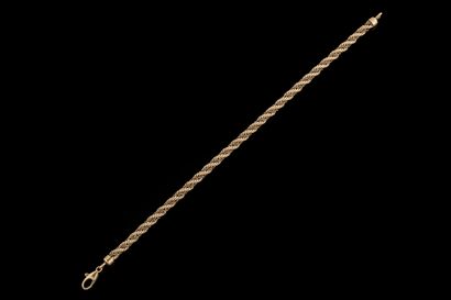 Twisted bracelet adorned with a yellow and...