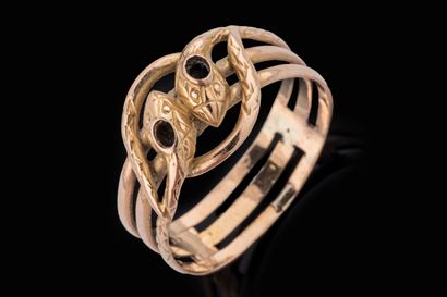 Bague à deux têtes de serpent en or jaune...