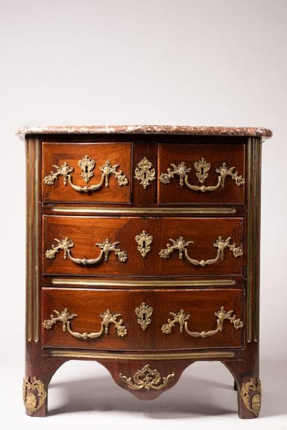 Mid-century chest of drawers with a curved...