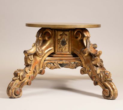 Molded, carved, and gilded wooden candelabra...