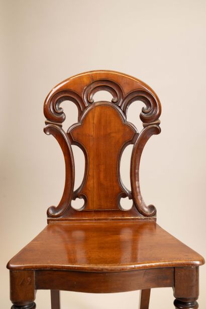 Pair of chairs with molded mahogany board...