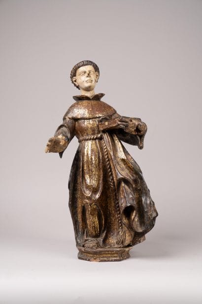 Carved, polychrome, and gilded wooden statue...