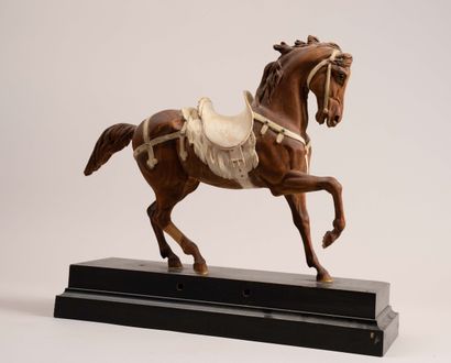 Carved and polychrome wooden horse 

20th-century...