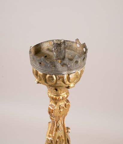 A baluster-shaped candleholder made of molded,...