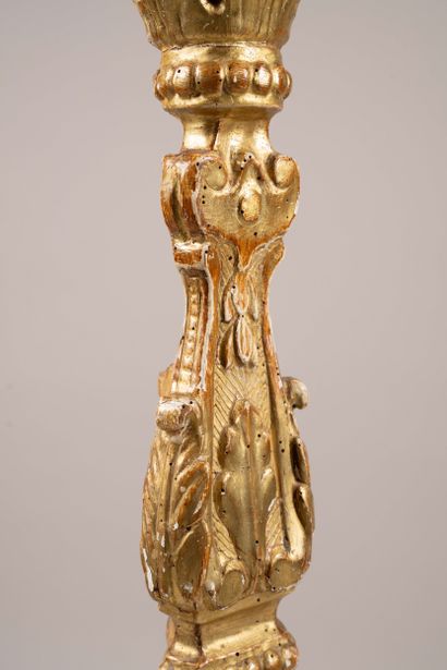 A baluster-shaped candleholder made of molded,...