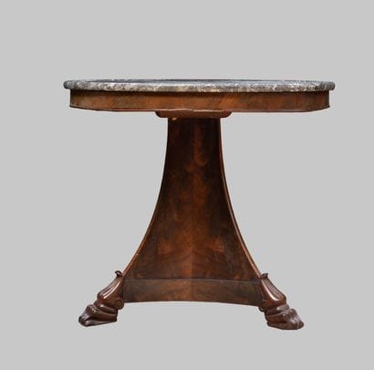 Mahogany and veneer pedestal table with a...