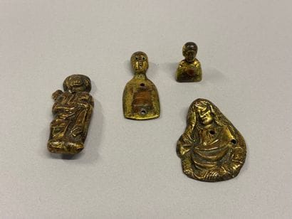 Set of four gilt repoussé copper wall sconces,...