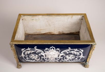 Varnished bronze planter with an enameled...