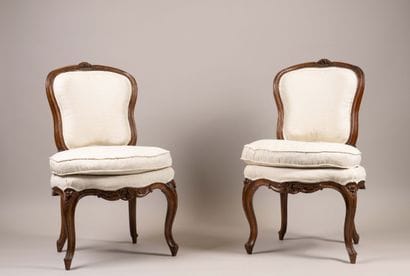 Pair of chairs with cabriolet backs in molded...