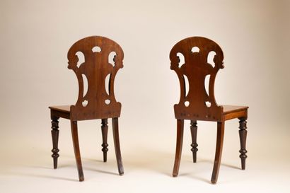 Pair of chairs with molded mahogany board...