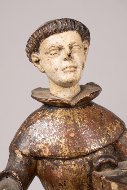 Carved, polychrome, and gilded wooden statue...